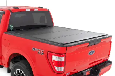 Rough Country - ROUGH COUNTRY Hard Tri-Fold Flip Up Bed Cover 6'10" Bed | Ford Super Duty (08-16)