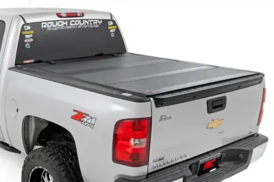 Rough Country - ROUGH COUNTRY HARD TRI-FOLD FLIP UP COVER CHEVY/GMC 1500 (07-13) | 5'9" BED W/ RAIL CAPS