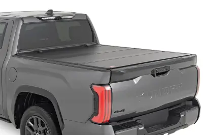 Rough Country - Rough Country Hard Tri-Fold Flip Up Bed Cover 5'7" | Toyota Tundra 2WD/4WD (2022-2025)