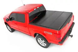 ROUGH COUNTRY HARD FOLDING BED COVER 5.5 FT BED | FORD F-150 2WD/4WD (15-21)