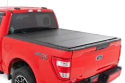 ROUGH COUNTRY Hard Tri-Fold Flip Up Bed Cover 6'10" Bed | Ford Super Duty (08-16)